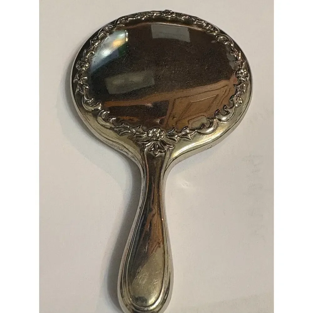 Sterling Antique Handheld Beveled Floral Design